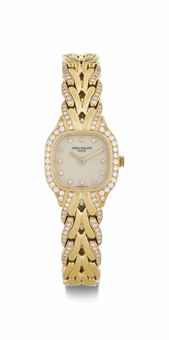 Patek Philippe. A Lady's 18k Gold and Diamond-Set Bracelet Watch