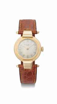 Patek Philippe. An unusual 18K pink gold wristwatch with hooded lugs