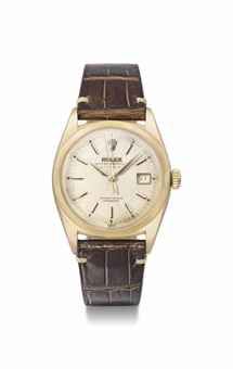 Rolex. A fine 18K pink gold automatic wristwatch with sweep centre seconds and date