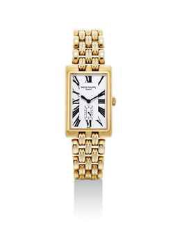 PATEK PHILIPPE. A FINE 18K GOLD RECTANGULAR WRISTWATCH WITH BRACELET