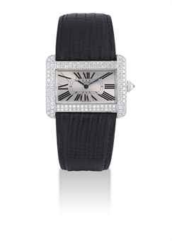 CARTIER. A LADY'S FINE 18K WHITE GOLD AND DIAMOND-SET RECTANGULAR WRISTWATCH