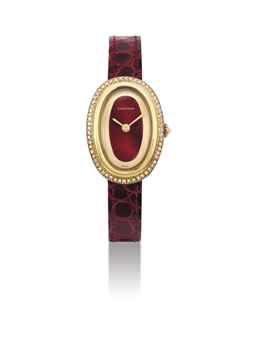 CARTIER. A LADY'S 18K GOLD AND DIAMOND-SET OVAL WRISTWATCH WITH RED ENAMEL DIAL