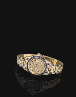 ROLEX. A LADY'S FINE AND RARE 18K GOLD DIAMOND AND SAPPHIRE-SET AUTOMATIC WRISTWATCH WITH SWEEP CENTRE SECONDS, DATE AND BRACELET