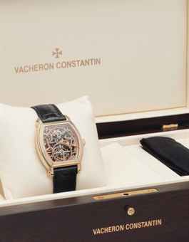Vacheron Constantin. A Fine and Rare 18k Pink Gold Skeletonized Tourbillon Wristwatch with Date and Power Reserve