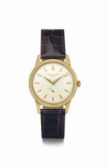 Patek Philippe. A Fine and Rare 18k Gold Wristwatch with Enamel Dial