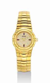 PIAGET. A LADY'S 18K GOLD, DIAMOND AND RUBY-SET BRACELET WATCH
