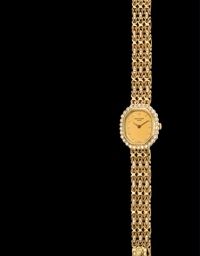 PATEK PHILIPPE. A LADY'S 18K GOLD AND DIAMOND-SET OCTAGONAL BRACELET WATCH