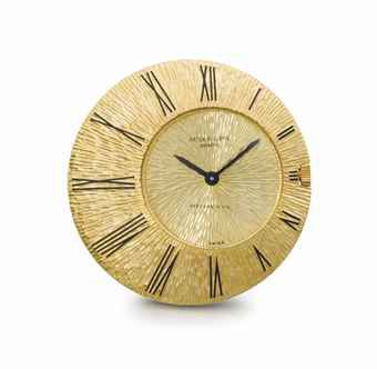 Patek Philippe. A fine, rare and unusual 18K gold asymmetrical keyless lever watch