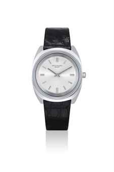 PATEK PHILIPPE. A STAINLESS STEEL TONNEAU-SHAPED WRISTWATCH