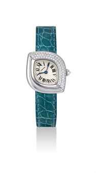 CARTIER. A LADY'S 18K WHITE GOLD AND DIAMOND-SET NAVETTE-SHAPED WRISTWATCH