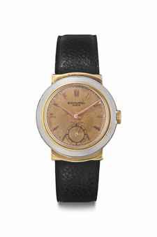 Patek Philippe. An 18k Pink Gold and Steel Wristwatch