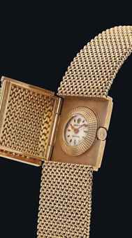 ROLEX. A LADY'S FINE AND RARE 18K GOLD SQUARE BRACELET WATCH WITH CONCEALED DIAL