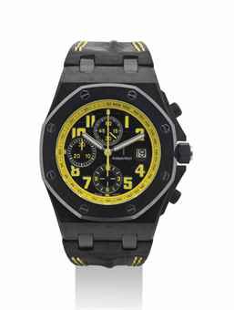 AUDEMARS PIGUET. AN OVERSIZED FORGED CARBON AND CERAMIC AUTOMATIC CHRONOGRAPH WRISTWATCH WITH DATE