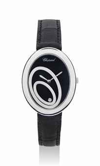 CHOPARD. A LADY'S FINE AND ATTRACTIVE 18K WHITE GOLD OVAL WRISTWATCH