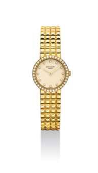 PATEK PHILIPPE. A LADY'S FINE 18K GOLD AND DIAMOND-SET BRACELET WATCH