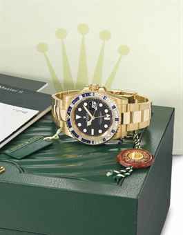 0olex. An extremely fine and rare 18K gold diamond and sapphire-set dual time automatic wristwatch with date, sweep centre seconds, bracelet, Guarantee and box