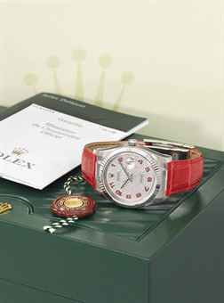 Rolex. An elegant 18K white gold and diamond-set automatic wristwatch with sweep centre seconds and date, original guarantee and box