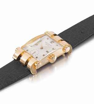 Patek Philippe. A very rare, fine and unusual 18K pink gold rectangular wristwatch with fancy lugs