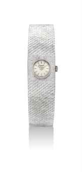 PATEK PHILIPPE. A LADY'S 18K WHITE GOLD BRACELET WATCH