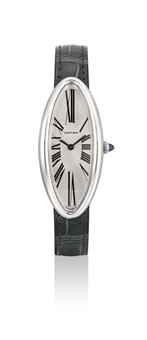 CARTIER. A LADY'S FINE 18K WHITE GOLD ELONGATED OVAL WRISTWATCH