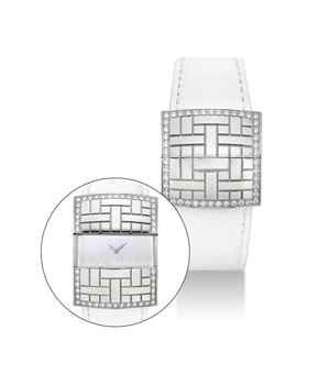 LÉON HATOT. A LADY'S STAINLESS STEEL AND DIAMOND-SET RECTANGULAR WRISTWATCH WITH CONCEALED DIAL