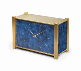 Patek Philippe. A Fine and Rare Gilt Brass and Blue Lacquer Quartz Electronic Desk Clock with Center Seconds