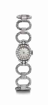 Patek Philippe. A Lady's 18k White Gold and Diamond-set Bracelet Watch