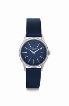 Patek Philippe. A Lady's Fine 18k White Gold and Diamond-set Wristwatch with Blue Dial