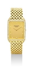PATEK PHILIPPE. AN 18K GOLD AND DIAMOND-SET RECTANGULAR BRACELET WATCH