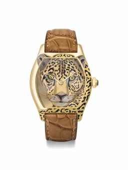 Cartier. A very fine, unusual and attractive 18K gold limited edition tortue wristwatch with high-relief enamel dial