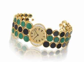 Patek Philippe. A rare and decorative 18K gold, diamond, black onyx and malachite bracelet watch