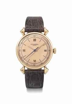 Patek Philippe. A fine, rare and very attractive 18K pink gold wristwatch with sweep centre seconds and two-tone pink dial