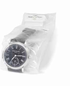 Patek Philippe. A very fine and rare platinum automatic minute repeating wristwatch with black laquered dial, original certificate, second case back and box, factory sealed