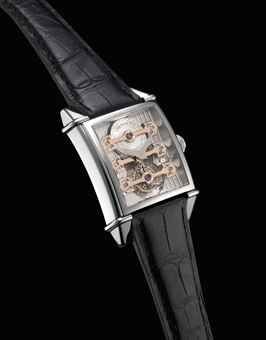 GIRARD-PERREGAUX. A VERY FINE PLATINUM RECTANGULAR AUTOMATIC TOURBILLON WRISTWATCH WITH THREE GOLD BRIDGES