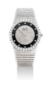 PIAGET. AN 18K WHITE GOLD AND DIAMOND-SET BRACELET WATCH