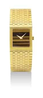 PAIGET. A FINE 18K GOLD SQUARE BRACELET WATCH WITH TIGER ’ S EYE DIAL