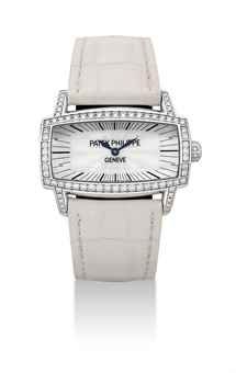 PATEK PHILIPPE. A LADY'S 18K WHITE GOLD AND DIAMOND-SET RECTANGULAR WRISTWATCH WITH MOTHER-OF-PEARL DIAL