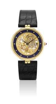 PATEK PHILIPPE. A FINE AND RARE 18K GOLD AND ENAMEL SKELETONISED WRISTWATCH