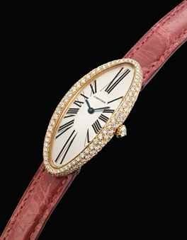 CARTIER. A LADY ’ S FINE 18K PINK GOLD AND DIAMOND-SET ELONGATED OVAL WRISTWATCH