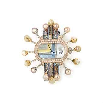 A DIAMOND AND MOTHER-OF-PEARL 'GRIFFE' QUARTZ WRISTWATCH, BY DELACOUR