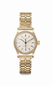 Patek Philippe. An 18k Pink Gold Wristwatch with Center Seconds and Associated 14k Pink Gold Bracelet