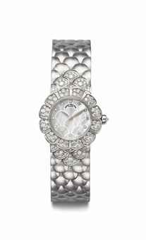 Patek Philippe. A Lady's Fine 18k White Gold and Diamond-set Bracelet Watch with Mother-of-Pearl Dial