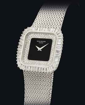 PATEK PHILIPPE. A FINE AND RARE 18K WHITE GOLD AND DIAMOND-SET CUSHION-SHAPED BRACELET WATCH WITH ONYX DIAL AND CERTIFICATE