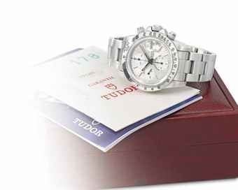 Tudor. A fine and very rare stainless steel automatic chronograph wristwatch with date, albino dial, bracelet, Garantie and box