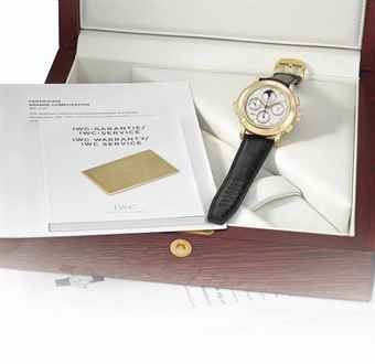 IWC. A very fine, rare and large 18K gold limited edition automatic perpetual calendar minute repeating chronograph wristwatch with moon phases, digital year display, two-tone dial, certificate, box and “Grande Complication” book