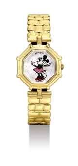 GERALD GENTA. A LADY'S 18K GOLD OCTAGONAL WRISTWATCH WITH BRACELET AND MOTHER-OF-PEARL DIAL