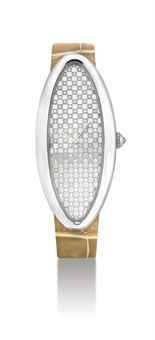 CARTIER. A LADY ’ S FINE 18K WHITE GOLD AND DIAMOND-SET ELONGATED OVAL CURVED WRISTWATCH