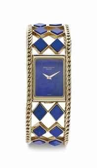 Patek Philippe. A Lady's Fine and Elegant 18k Gold and Lapis Lazuli Bracelet Watch