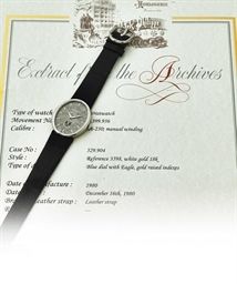PATEK PHILIPPE. A RARE 18K WHITE GOLD OVAL WRISTWATCH WITH IRAQI COAT OF ARMS