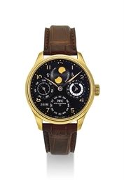 IWC. AN 18K GOLD AUTOMATIC PERPETUAL CALENDAR WRISTWATCH WITH MOON PHASES